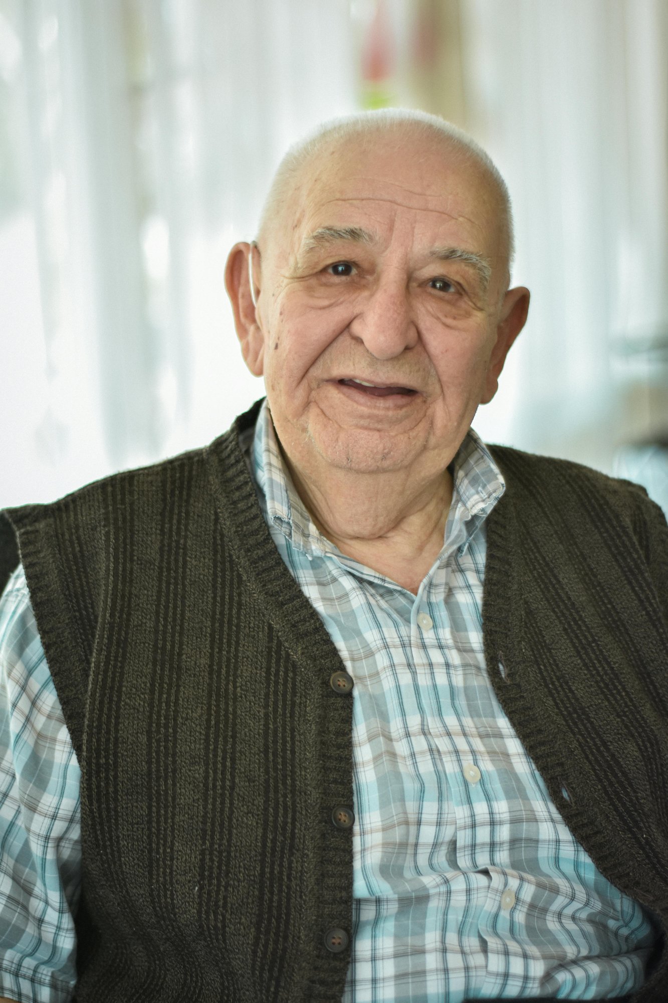 A man wearing a vest.