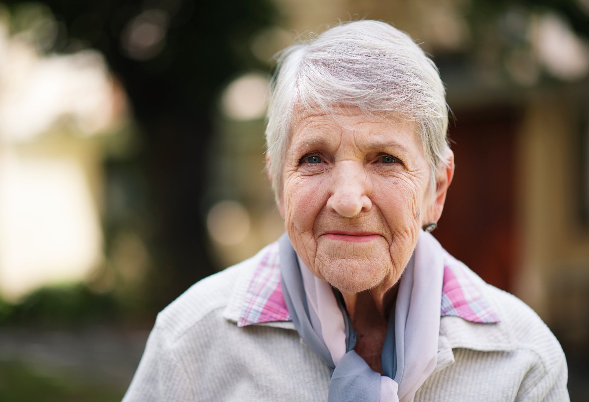 An old woman wearing a parker.